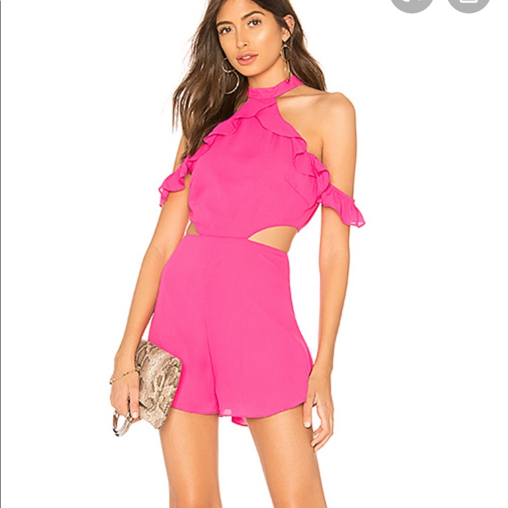 Hot pink revolver romper with side cut outs